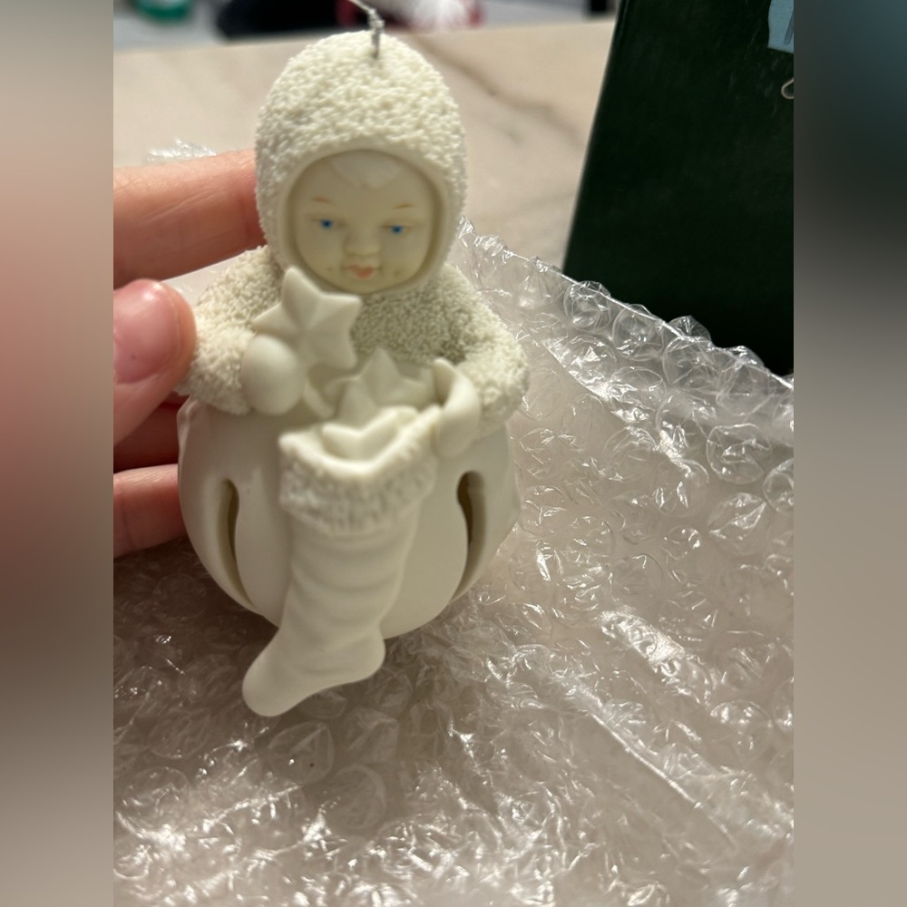 Ivory Baby Ornament with Stocking